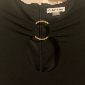 Calvin Klein Black Top with Gold O-Ring Accent